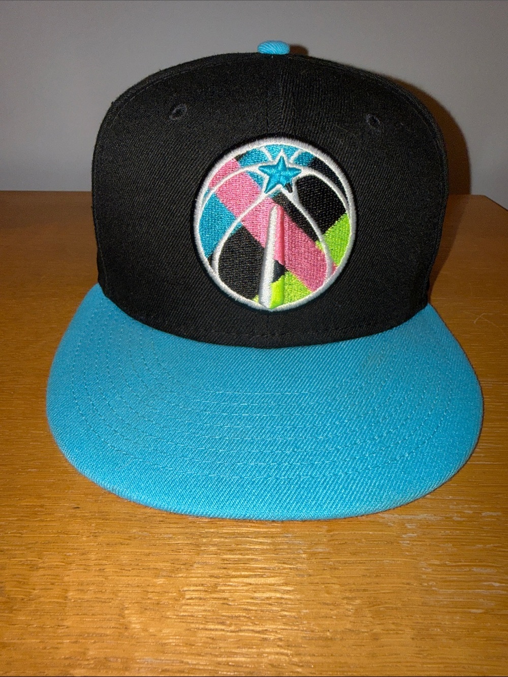 New Era Black & Teal Basketball Logo Snapback Hat with Pink & Lime Accents